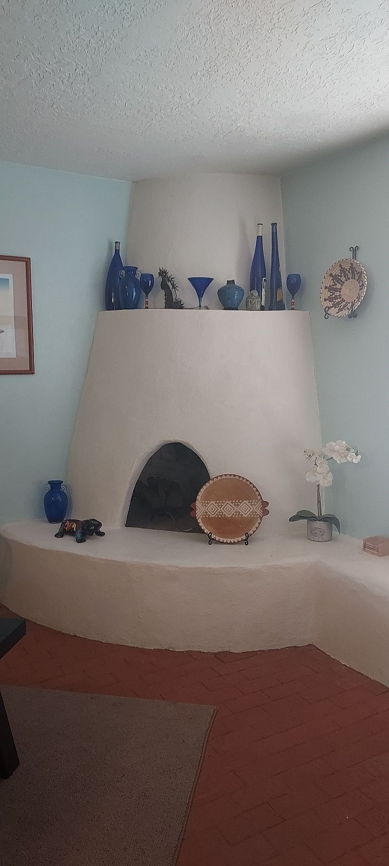 Decorative Kiva Fireplace in the Living Room...Not allowed to lighten for liability....