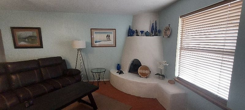 Decorative Kiva Fireplace in the Living Room...Not allowed to lighten for liability....