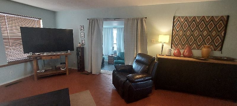 Extra large Smart TV in the living room with high speed internet.