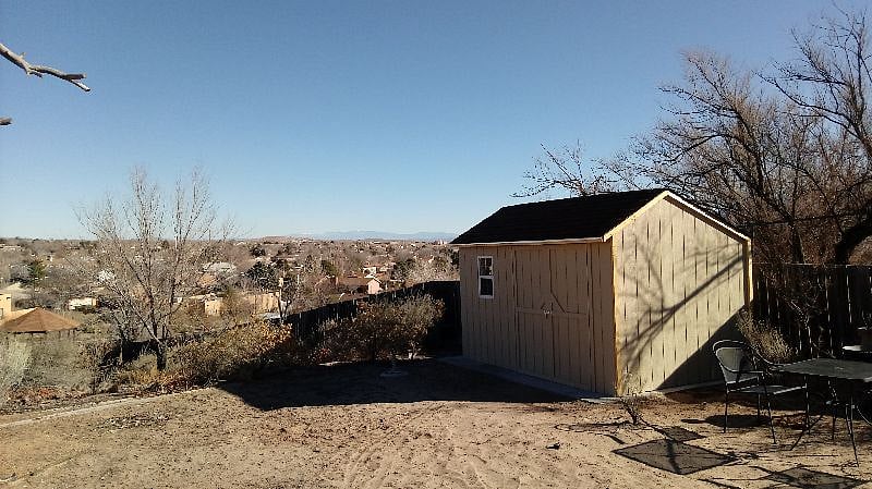 More of the backyard with our locked storage shed for our personal belongings.