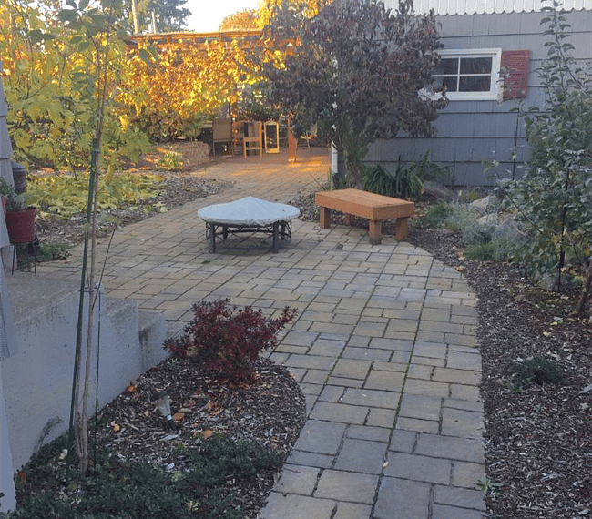 Venture outside and enjoy our Certified Backyard Habit. It is a private backyard with a fire pit, flower, fruit, herb, and vegetable garden, and clothesline.  