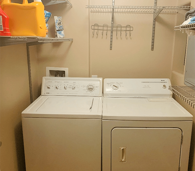 Washer and dryer in-unit laundry room. 