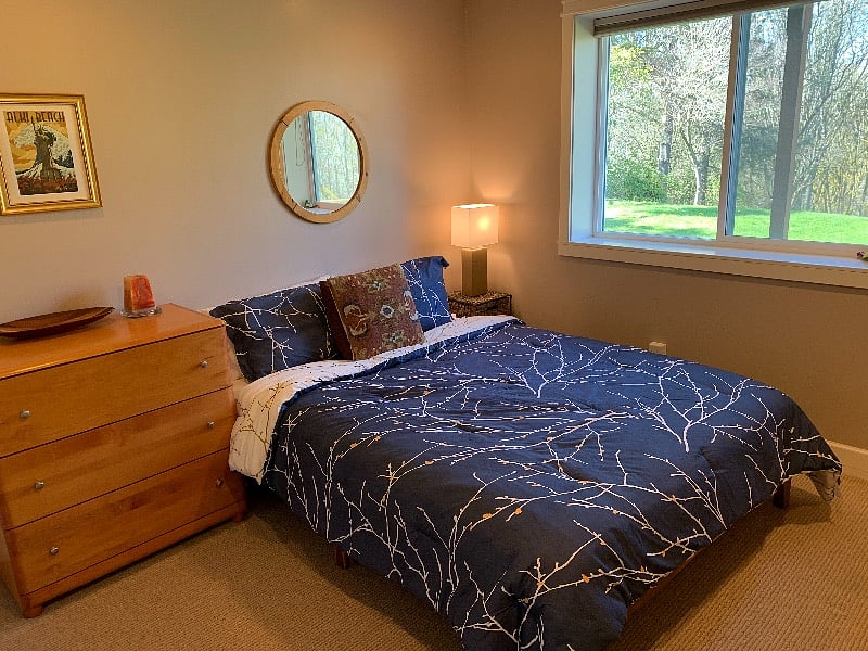 Second bedroom with comfy queen bed and black-out blinds.