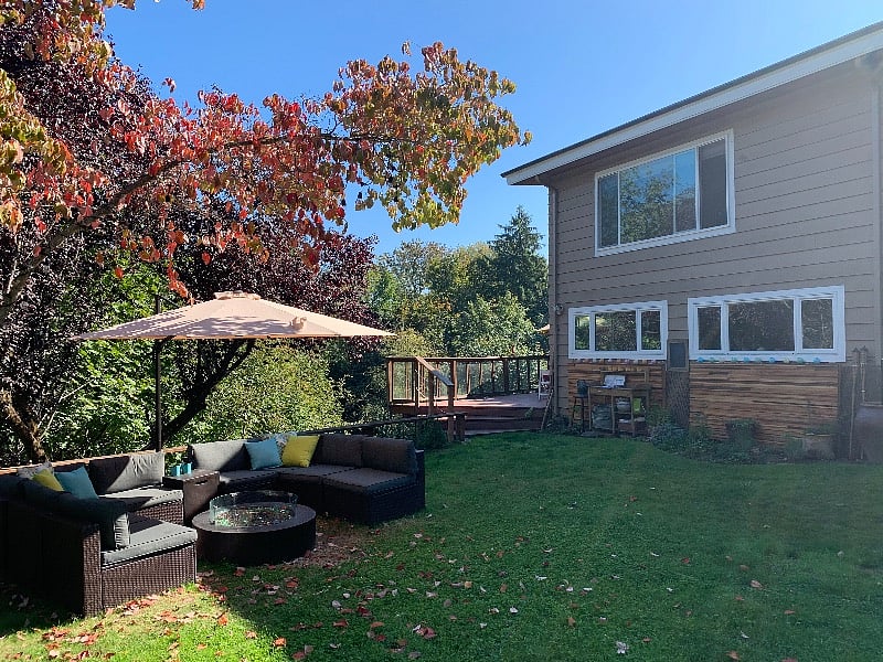 Outdoor lounge and apartment kitchen windows on the bottom left.