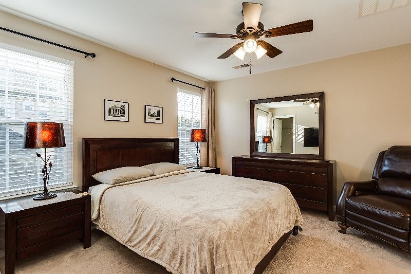 Suite 3 with en-suite bath, walk in closet, smart TV, and smart-lock suite door.