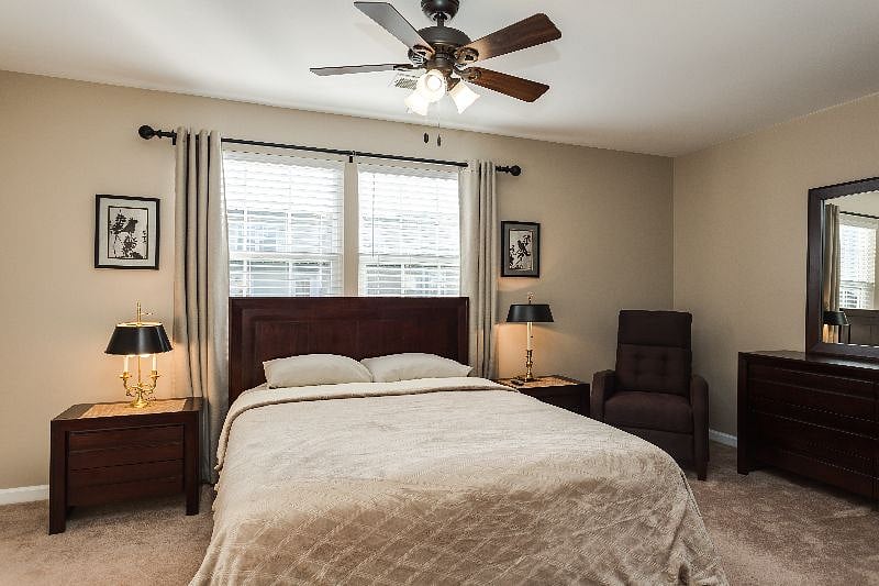 Suite 4 with en-suite bath, walk in closet, smart TV, and smart-lock suite door.