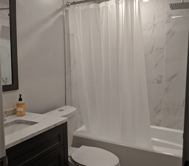 Bathroom with linens included.