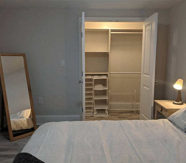 Bedroom with walk in closet.