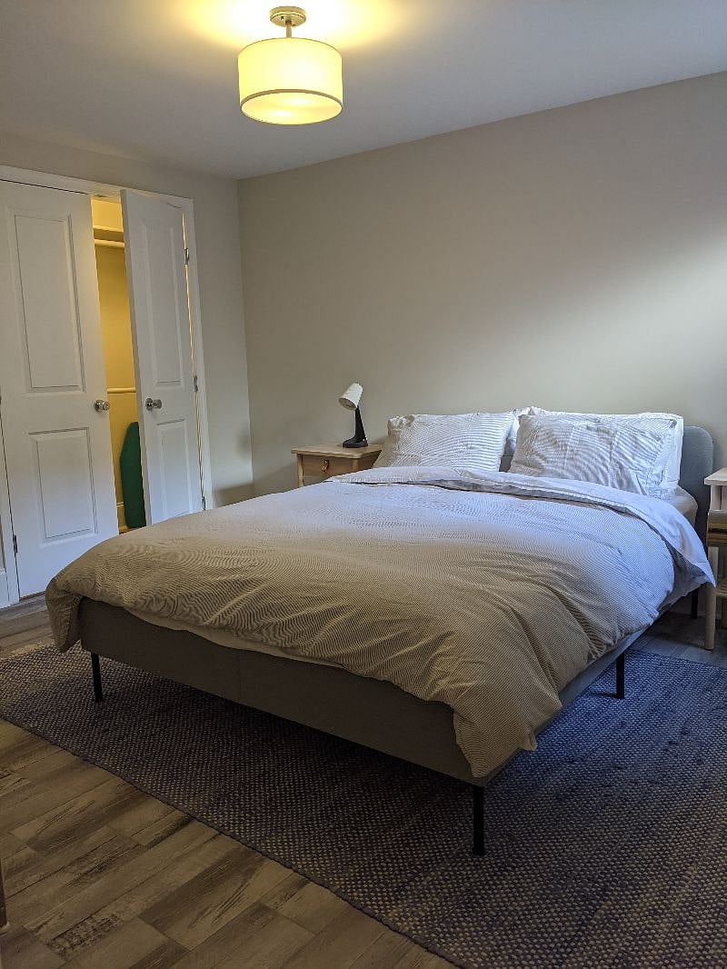 Bedroom with ample closet space and light.