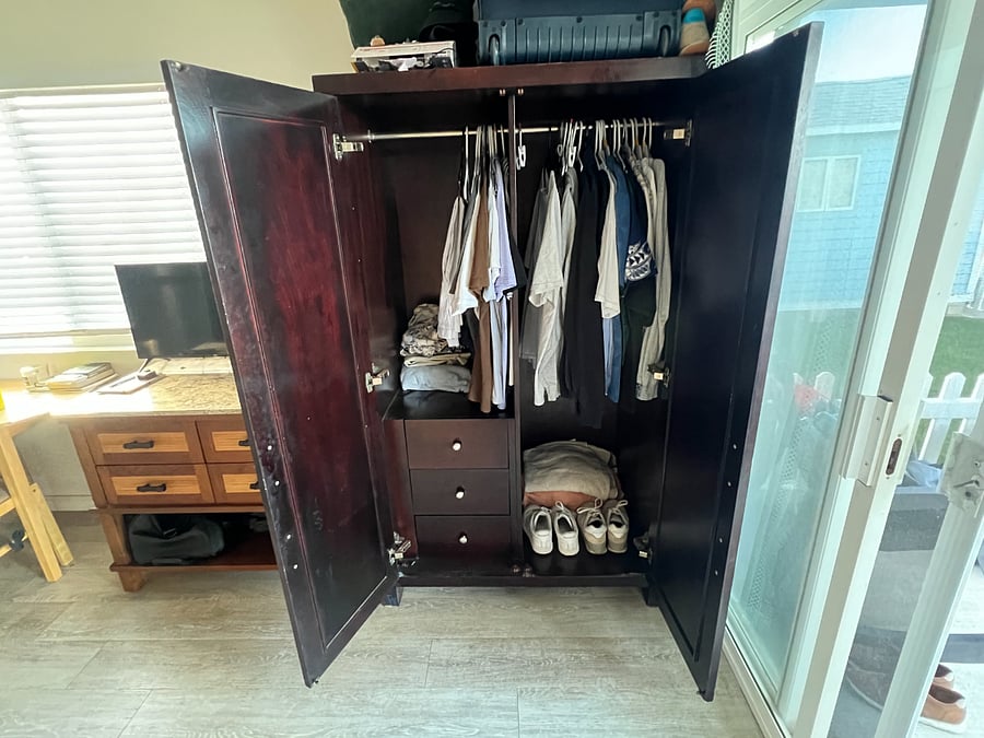 Plenty of clothing storage with drawers too