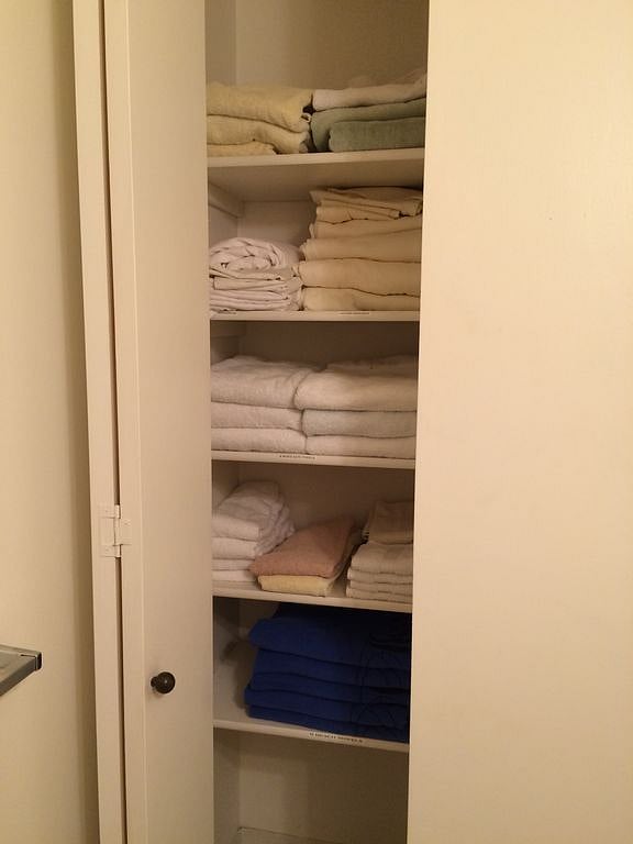 Linen closet in half-bath