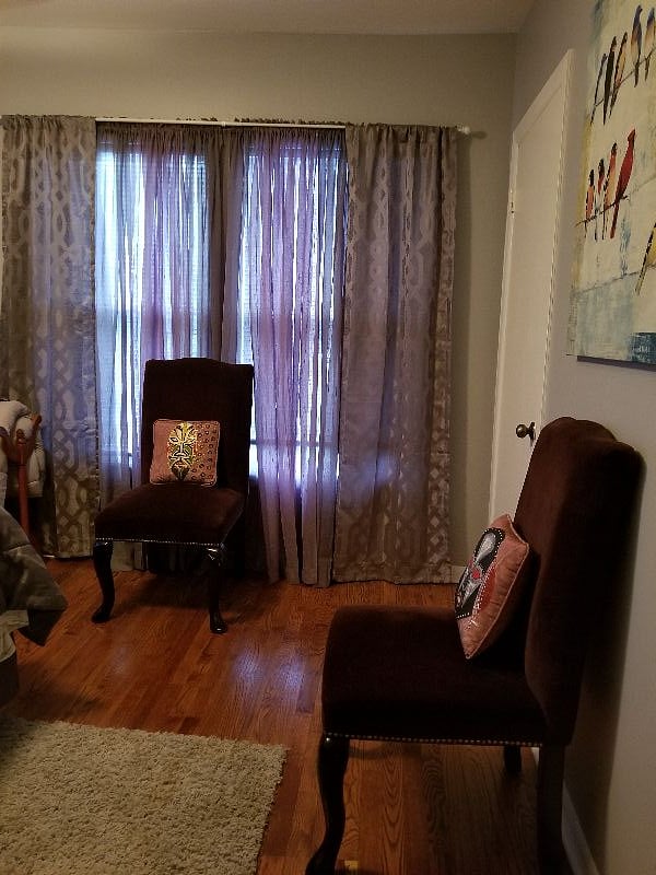 This is front window & closet of upstairs unit.