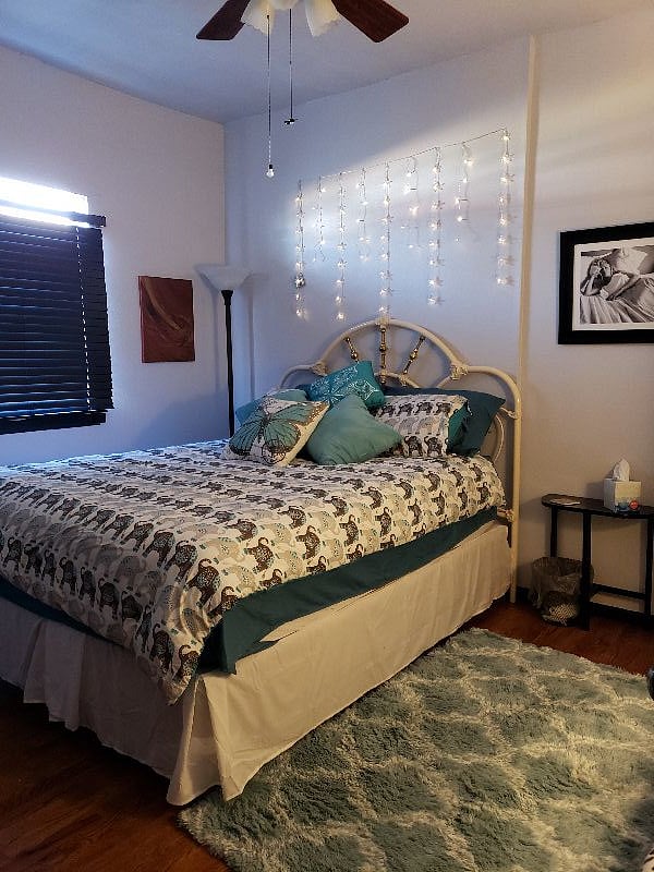This is bedroom with queen bed in downstairs unit.