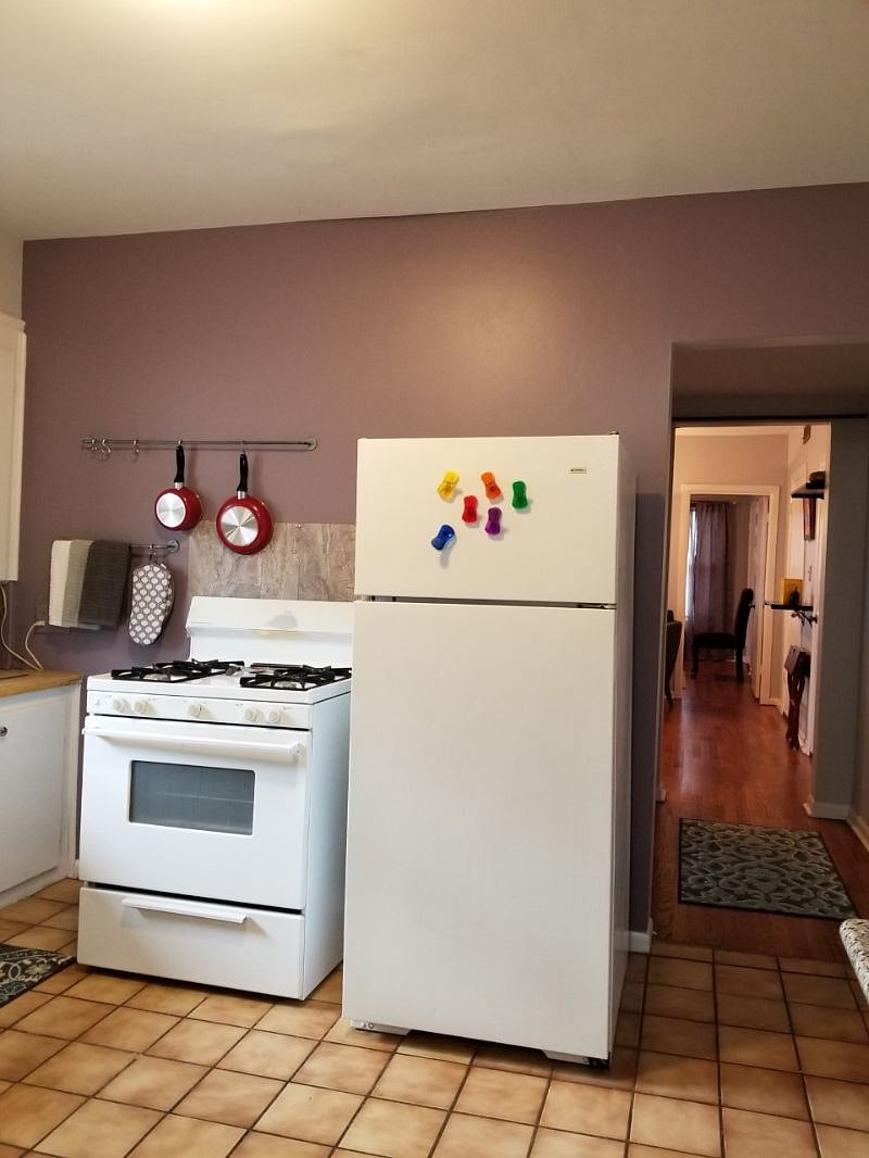 This is kitchen of upstairs unit.