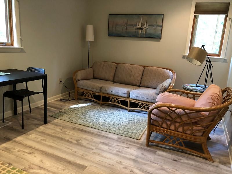 Sitting area with table for meals or other uses