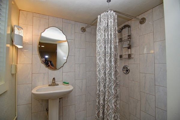 All new bath with shower and heated towel bar