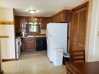 Kitchen and laundry room through the doors to your right.
