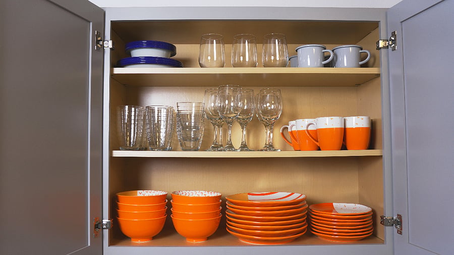Colorful dinnerware, cups, and glasses.