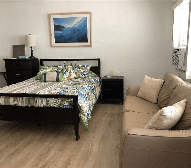 Comfy queen bed and leather couch.  