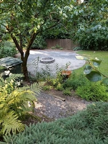 View from back patio to fire pit area.