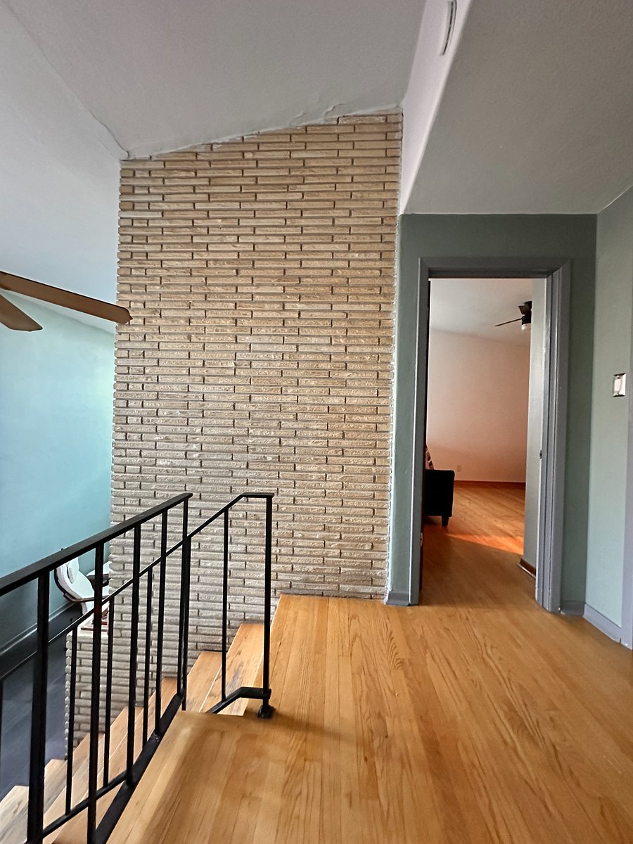Top of stair, looking into loft