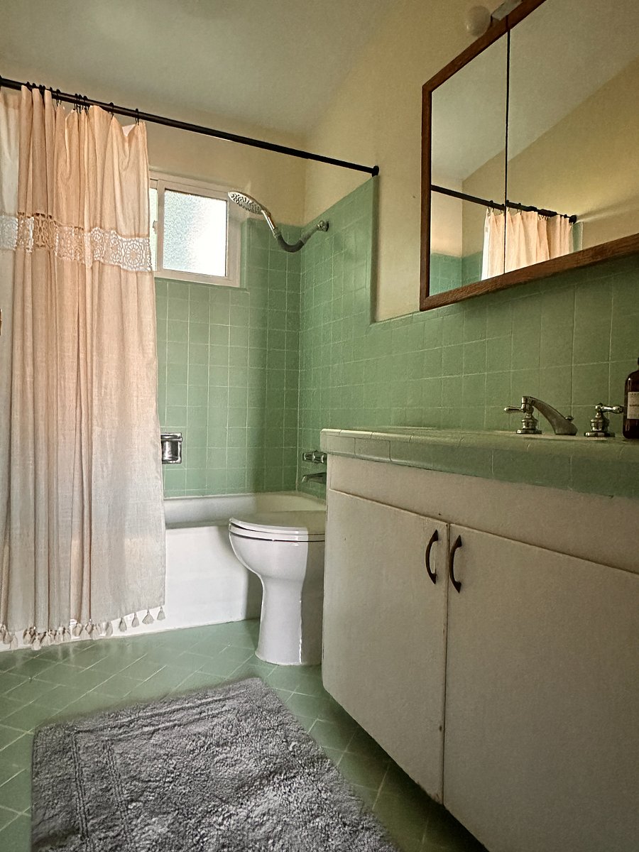 Upstairs bathroom in retro-fabulous sea-foam green!