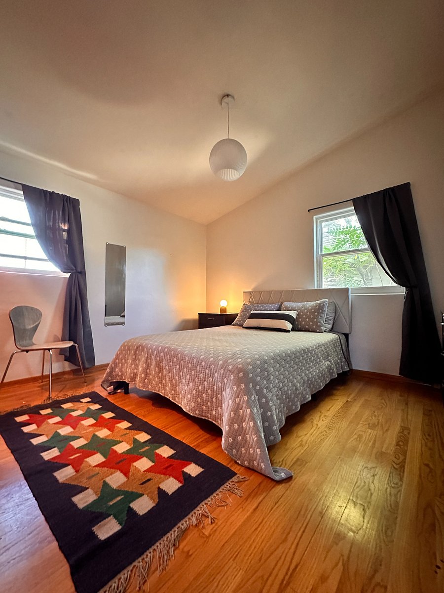 Upstairs bedroom 1, queen bed, full-sized dresser, double closets