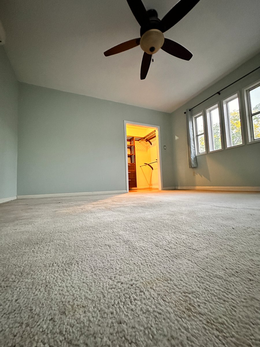 Carpeted master bedroom, with walk-in closet. FURNISHING UNDERWAY!