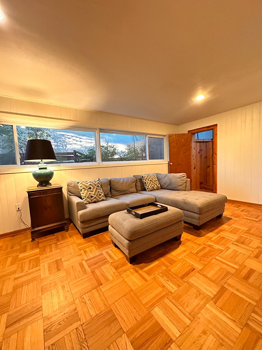Den with cozy sectional