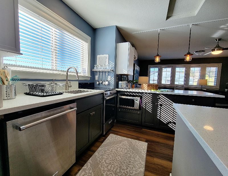 Kitchen area, stove and oven, dishwasher, convection/microwave oven.