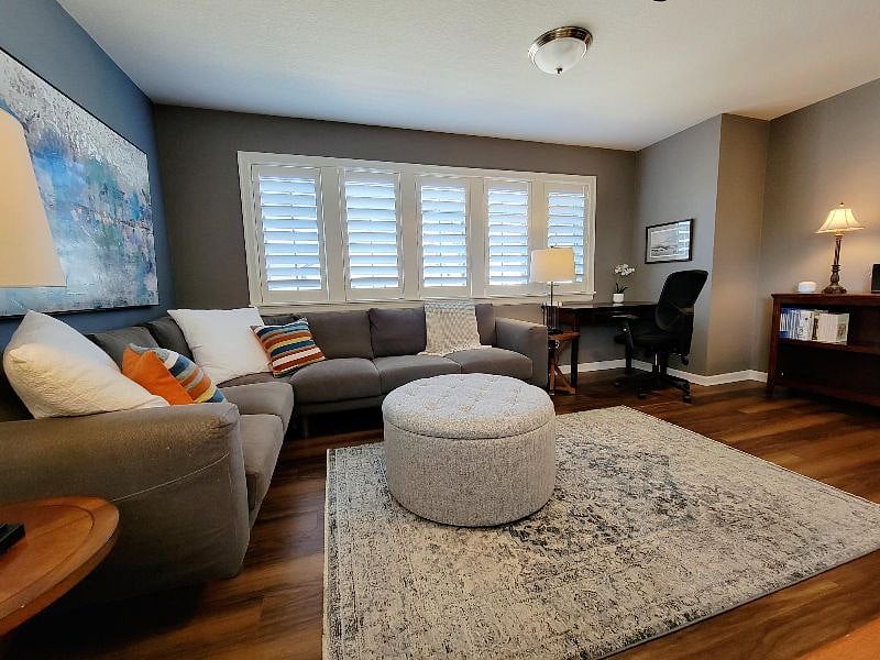 Sitting area detail. Windows open for fresh air and cross circulation. Plantation shutters operate to allow full sun or partial black out.
