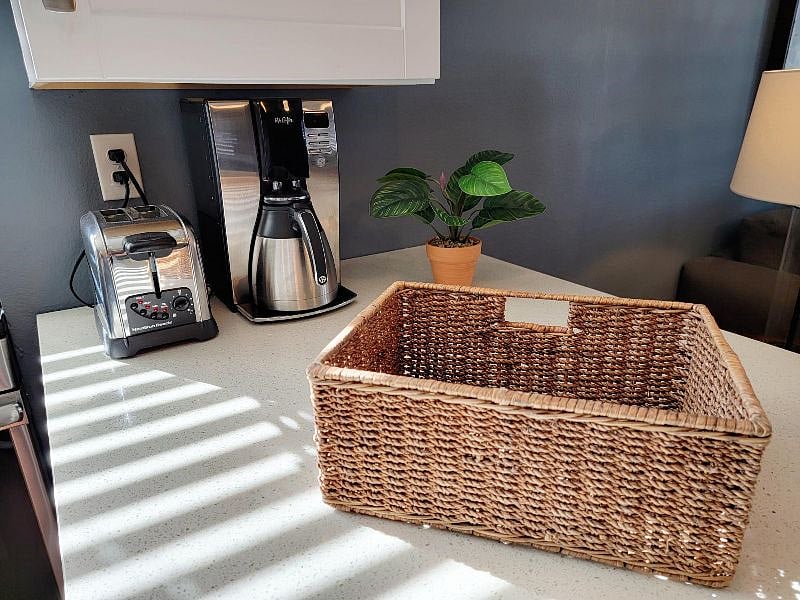 Kitchen detail, toaster and coffee maker provided.