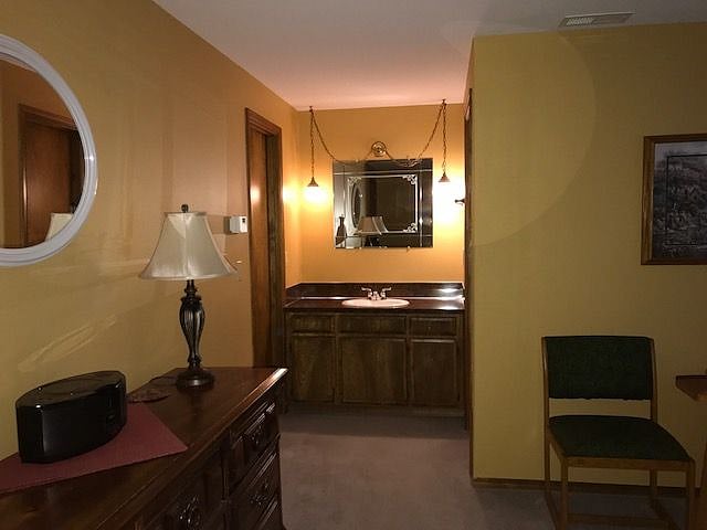 Recently added kitchen mini fridge, oven, shelfing & supplies.to this area. 
