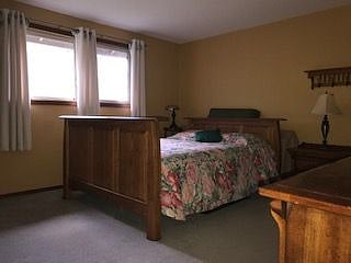 bed with spring comforter 
