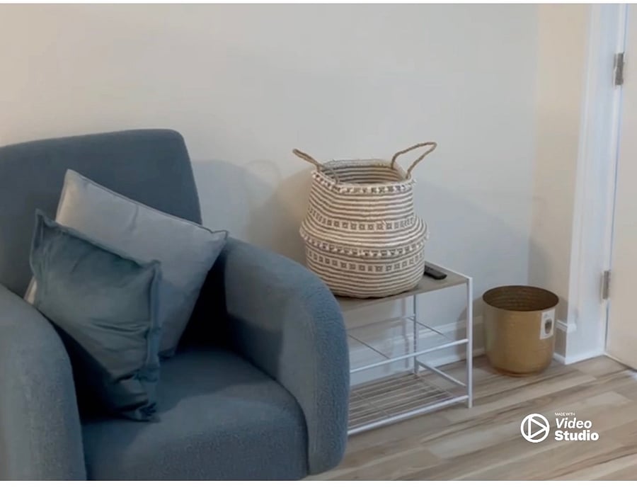 unit 07 living room chair near entry door