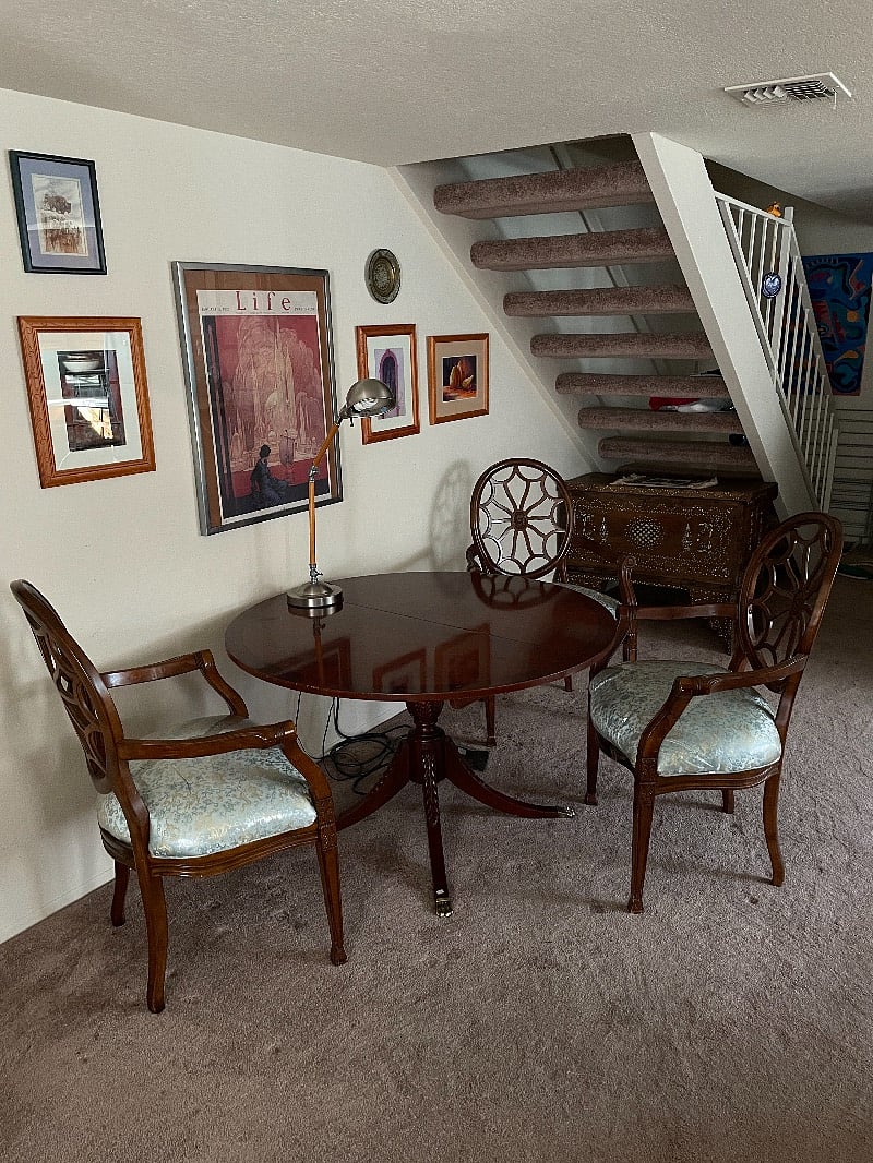 Dining area, stairs shown go up to the non-included loft bedroom (this additional bedroom is in the 2-bedroom listing)