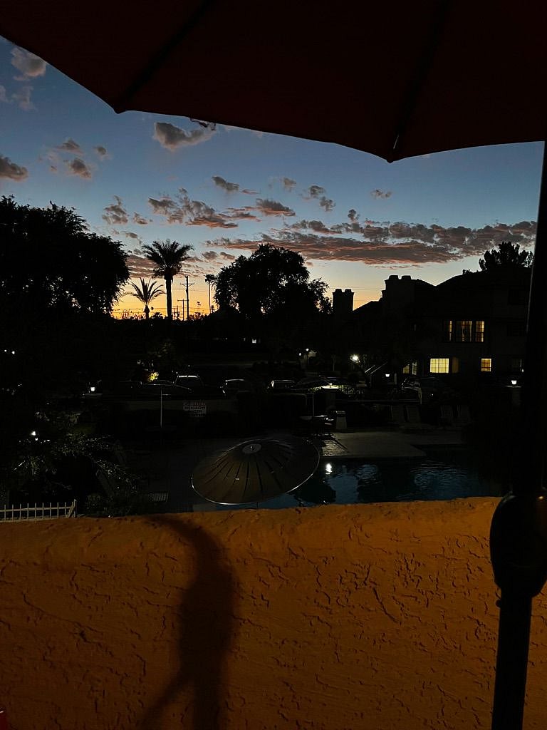 Sunset off the front entrance porch.  Happens every night!
