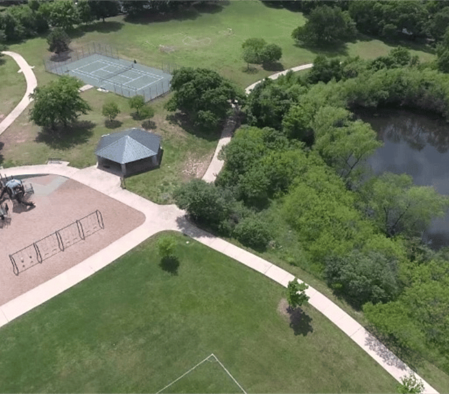Nearby park. Ten minute walk, if that long. Beautiful pond with turtles, walking trail, tennis court, etc. Fishing pond with fountain at the front of the park.