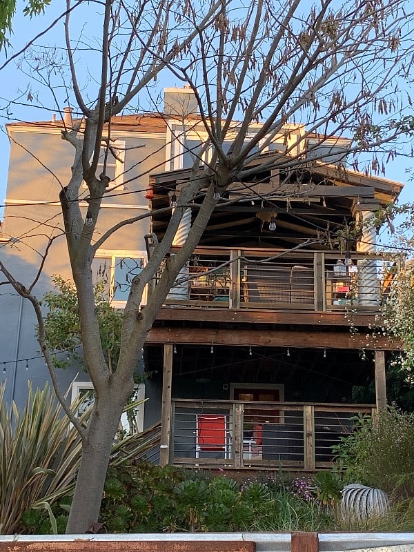 view of the rear of the house, your deck is the lower one. 
