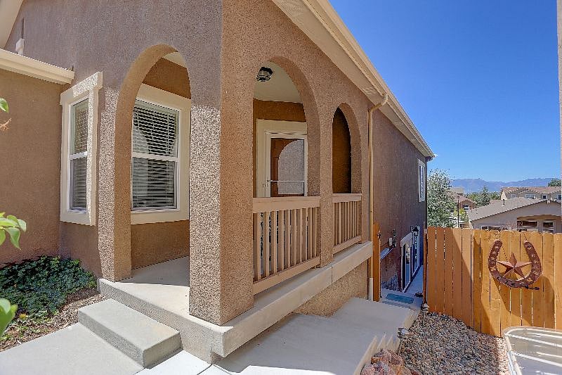 Sidewalk Entrance Beside the Front Porch.