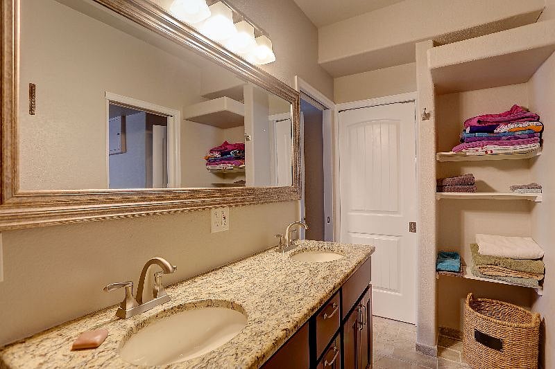 Full Bathroom Double Sink with Private Entrance to the Master Bedroom and Door to Great Room.