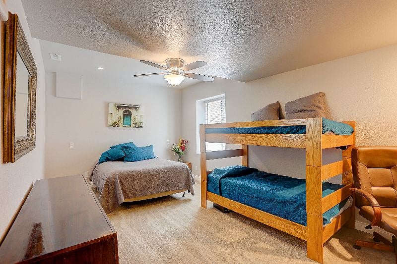 Second Bedroom with Queen Bed and Bunk Beds.