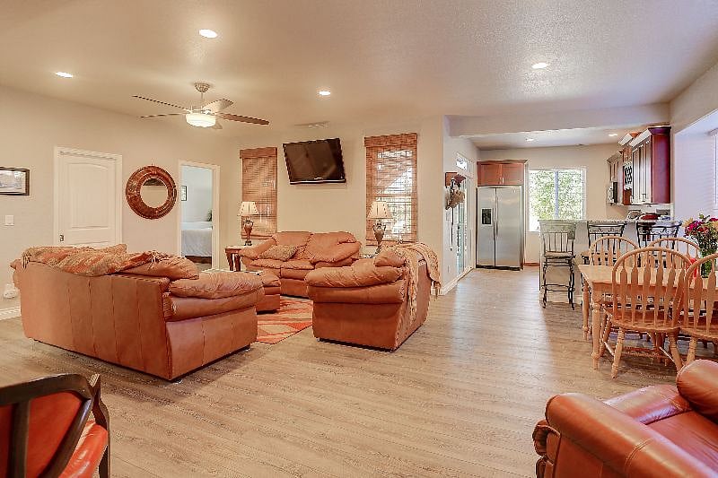 Great Room and Kitchen showing Full Size Side By Side Refrigerator/Freezer