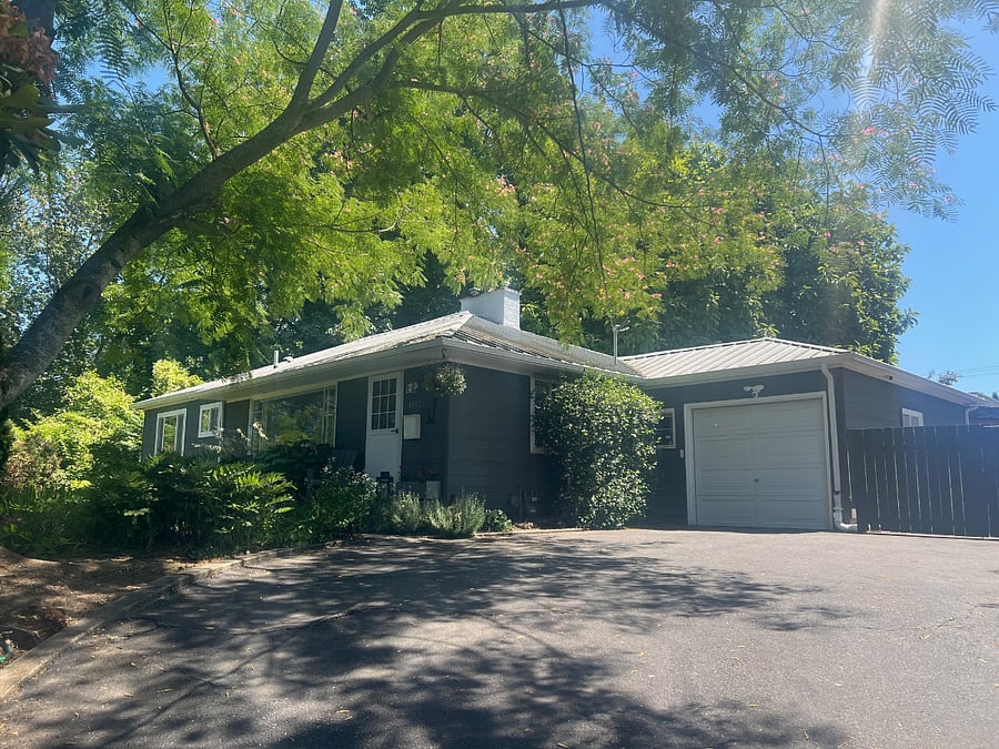 Driveway and house sit above the neighborhood for great privacy