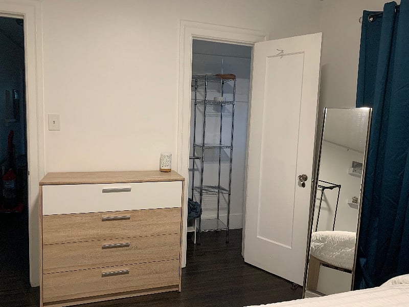 Room 1: small walk-in closet and stand up mirror
