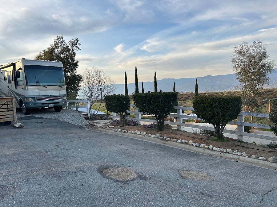 Parking area in front of entrance to The Coach
