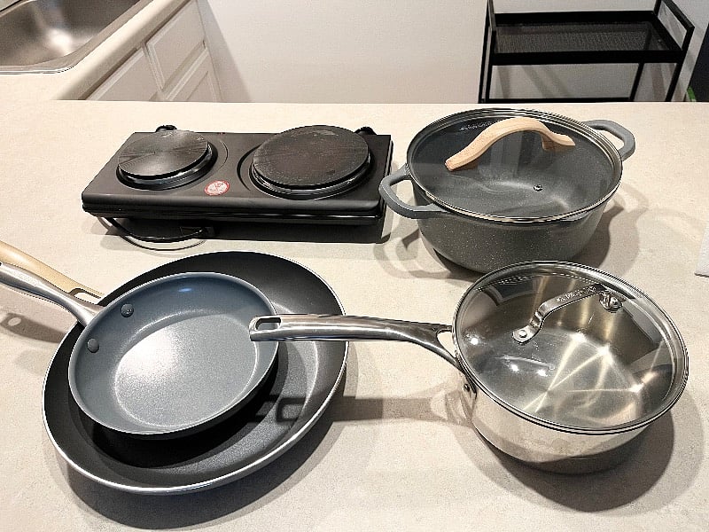 hot plate with pots and pans