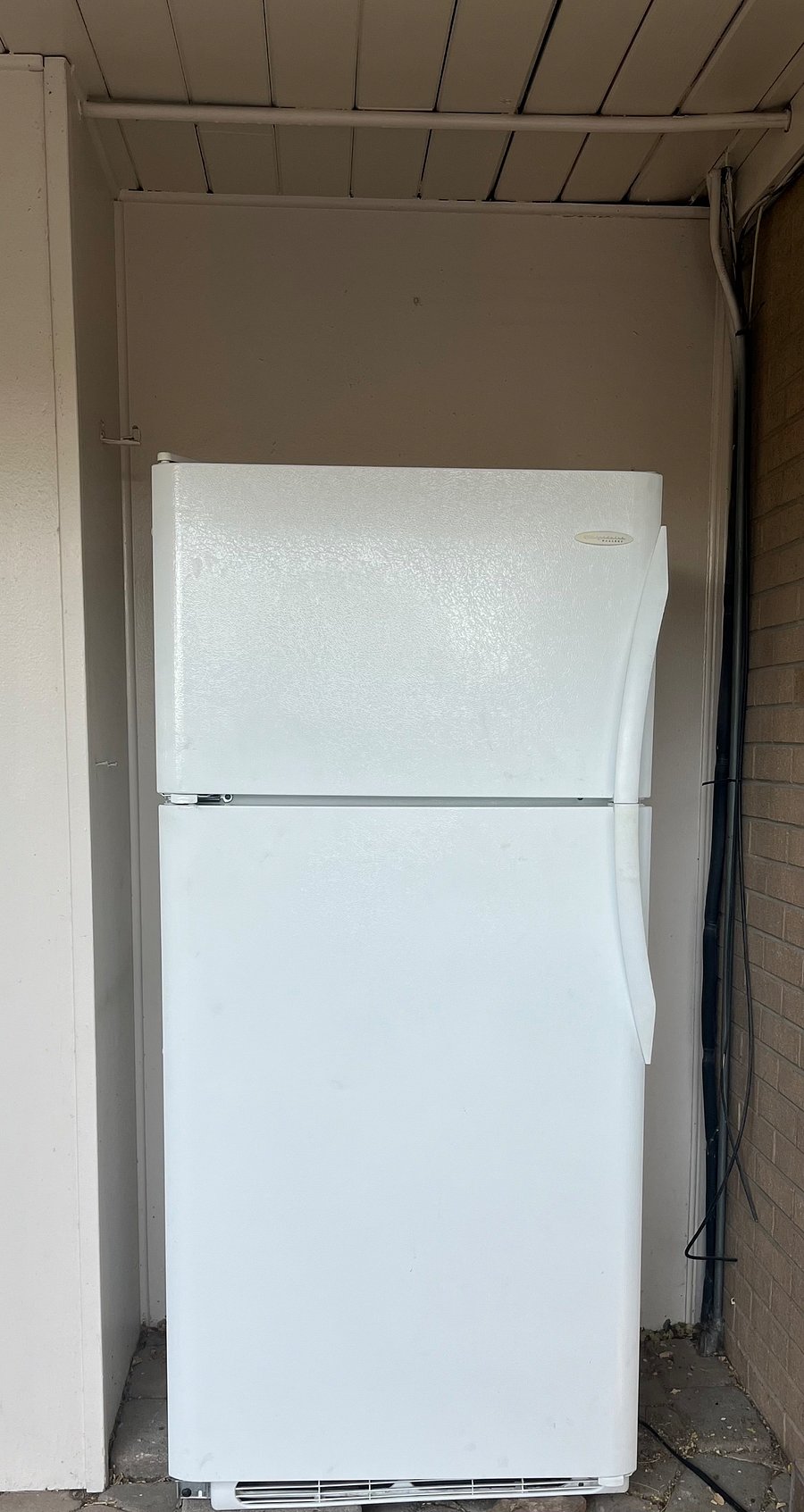 Full size fridge for tenant use on covered patio. Also small fridge in rental space.