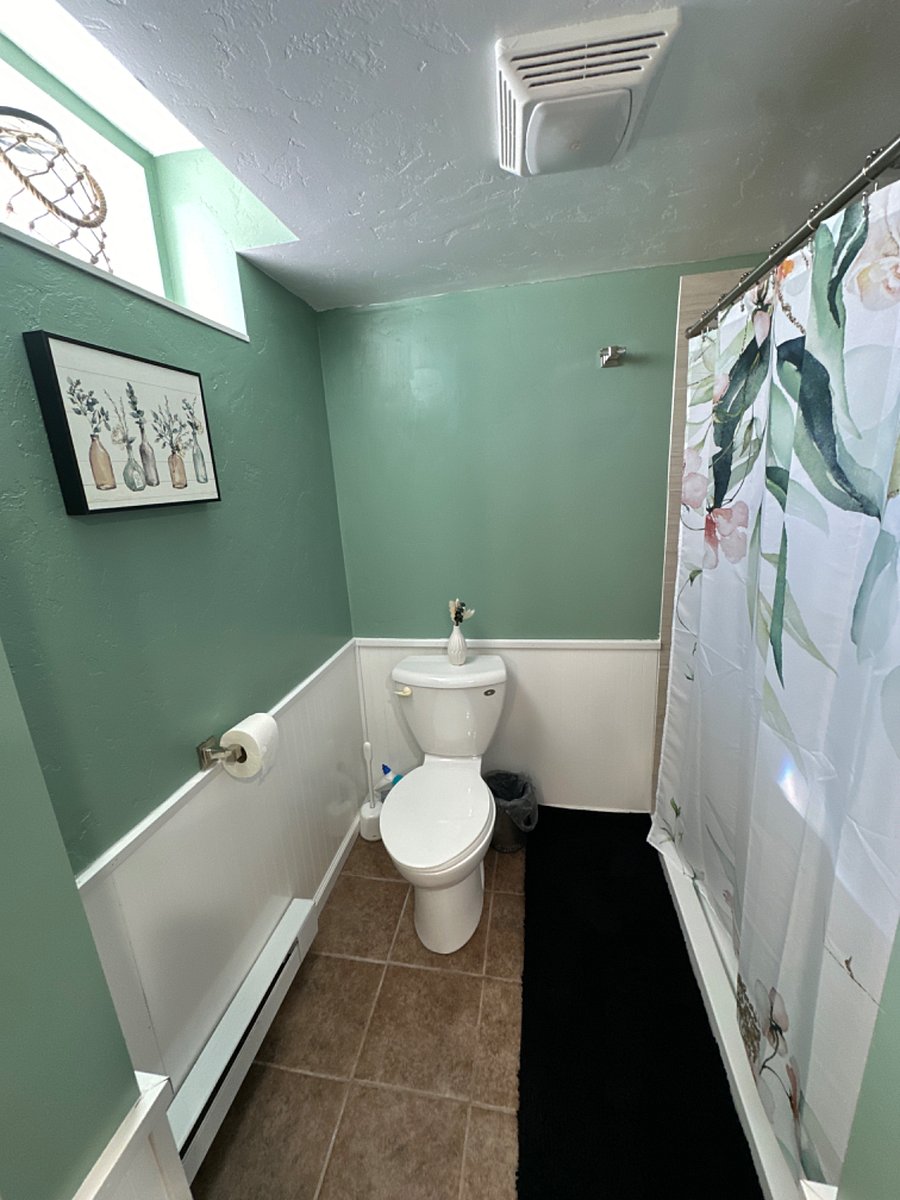 Private Bathroom, Floor Pan Shower, Basement, Renovated in 2023, Assigned to "Elegant Room"