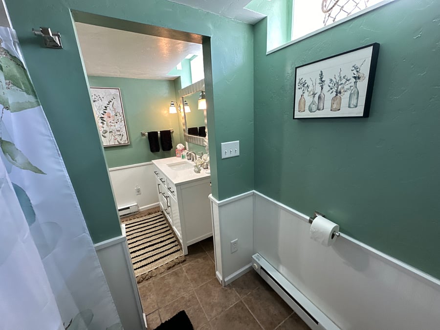 Private Bathroom, Floor Pan Shower, Basement, Renovated in 2023, Assigned to "Elegant Room"